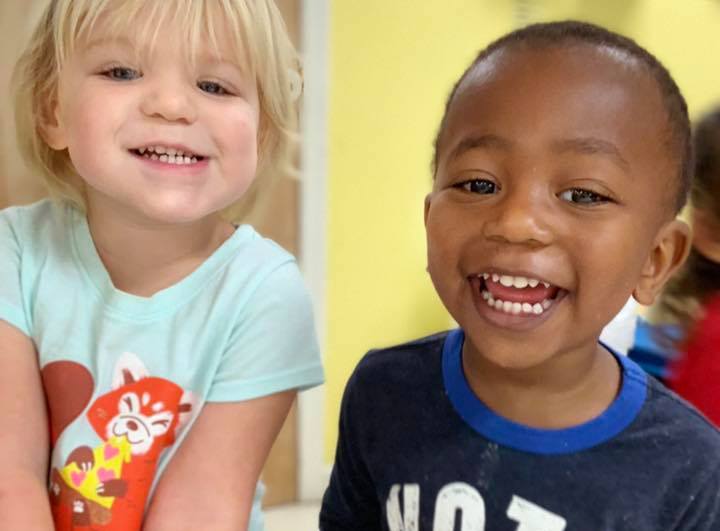 Happy cute african american nursery boy and a cute little nursery girl at a Preschool & Daycare Serving Hampton Roads, VA